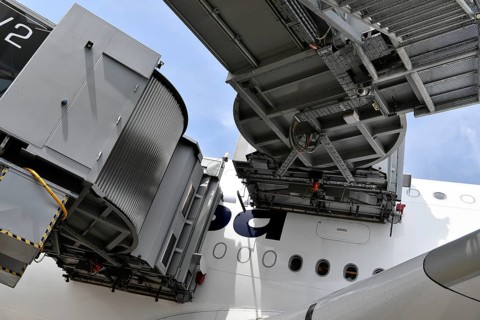 Lufthansa Airbus A380-800 with docked passenger boarding bridges at check-in position, Munich