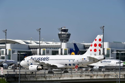 Full tarmac with heavy traffic with Brussels Airlines in front of Terminal 2, Munich Airport, Upper