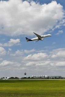 Lufthansa Airbus A350-900 taking off on runway south with tower, Munich Airport, Upper Bavaria,