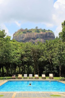 Swimming pool view to Rock Palace at Hotel Sigiriya, Sigiriya, Central Province, Sri Lanka, Asia