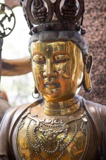 Brass Buddha figure, Gangaramaya Buddhist Temple, Colombo, Sri Lanka, Asia