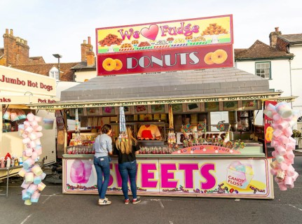 Mops fair fairground, High Street, Marlbrough, Wiltshire, England, UK October 7th 2023, Donuts and