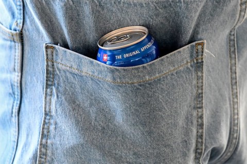 Trouser pocket Beer can