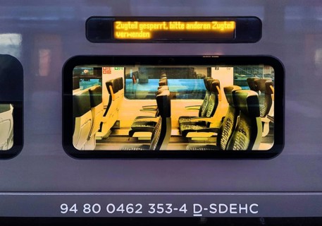 Train section blocked, illuminated sign on a local train at the main station in the evening,