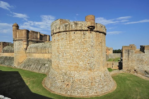 Moat and ramparts of the Catalan fortress Fort de Salses at Salses-le-Chateau, Pyrenees, France,