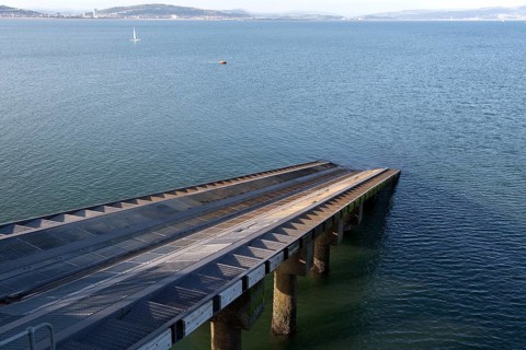 Lifeboat station chute slide into the sea, Mumbles pier, Gower peninsula, near Swansea, South
