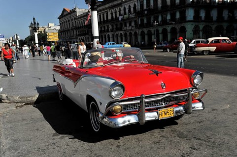 Ford convertible, open-top vintage car from the 1950s in the centre of Havana, Centro Habana, Cuba,