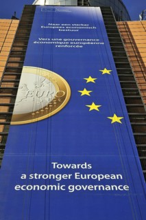 Banner about the euro hanging from the Berlaymont building of the European Commission, executive