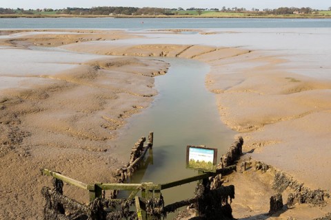 Drainage sluice into the River Deben, Sutton, Suffolk, England, UK