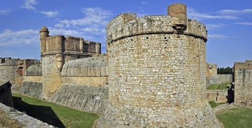 Moat and ramparts of the Catalan fortress Fort de Salses at Salses-le-Chateau, Pyrenees, France,