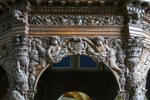 Renaissance-style carved canopy of the baptismal font, Enclos Paroissial enclosed parish of