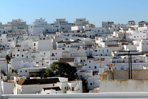 Pueblo blanco historic village whitewashed houses on hillside, Vejer de la Frontera, Cadiz