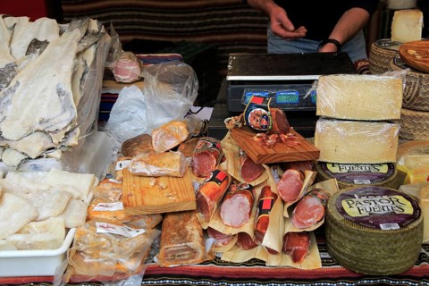 Display of fish, meat and cheese products on market stall, Algeciras, Spain, Europe