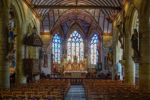 Nave, main altar and choir of the church of Saint Germain, Enclos Paroissial de Pleyben enclosed