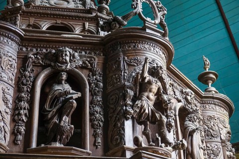 Renaissance-style carved canopy of the baptismal font, Enclos Paroissial enclosed parish of