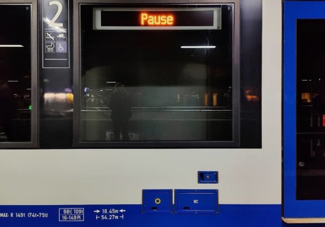 Break, illuminated sign on a local train at the main station in the evening, Duesseldorf, North