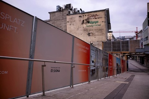 Construction site, controversial building project of Rene Benko's insolvent company Signa, logo,