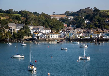 Yachts at moorings on River Fal, Flushing, Cornwall, England, UK