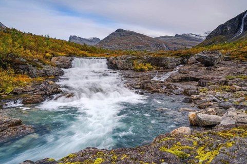 Autumn in Reinheimen National Park, mountains with river in Valldalen valley, Stigbotthornet