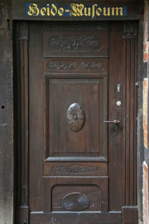 Old wooden door of the Heidemuseum, Rischmannshof Heath Museum, open air museum at Walsrode,
