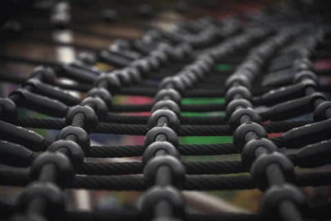Detailed view of a rope net on a children's playground with bokeh effect, Wuppertal Elberfeld,