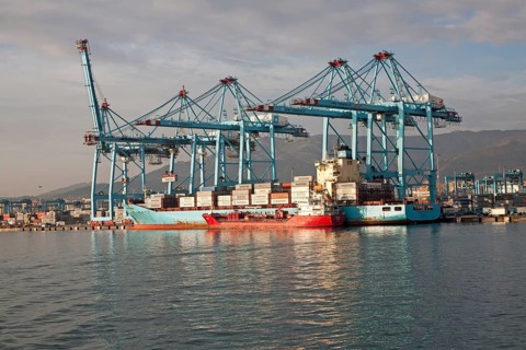 Large cranes at APM Terminals loading container ships port at Algeciras, Cadiz Province, Spain,