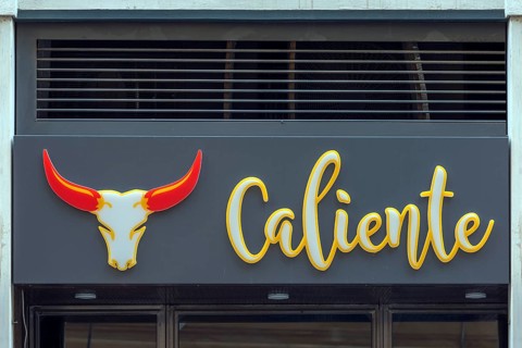 Logo and lettering of Restaurant Caliente, Salita Santa Caterina, 34r, Genoa, Italy, Europe