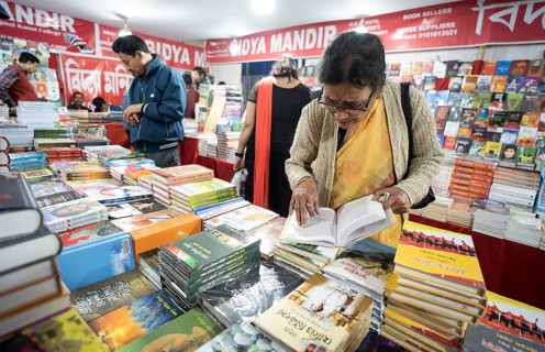 Book readers browsing books at a stall during Assam Book Fair, in Guwahati, Assam, India on 29