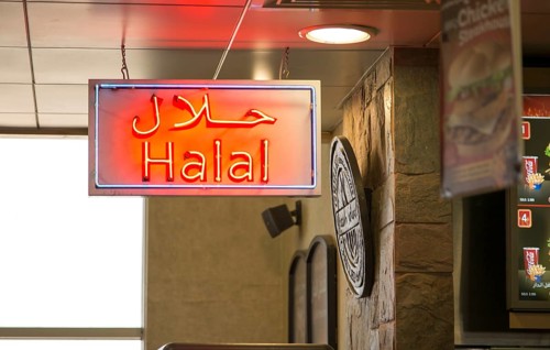 Neon sign for Halal food, Seeb International Airport, Muscat, Oman, Asia