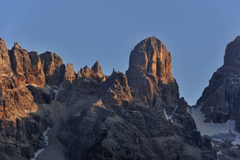 Alpenglow at sunset over the mountain Monte Cristallo in the Dolomites, Italy, Europe