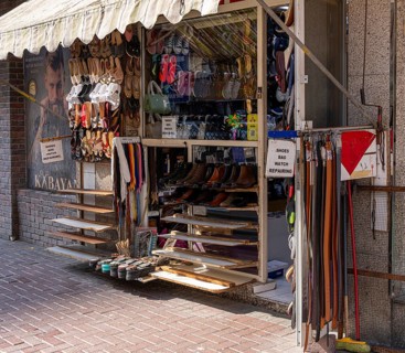 Shoe shops and craftsmen in the Al Fahidi neighbourhood, Dubai, United Arab Emirates, Asia