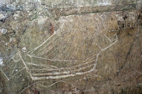 Old graffiti of galleon sailing ship carved on rampart wall of the citadel at Brouage,