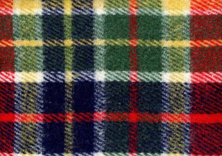 Red green blue and yellow tartan fabric texture background