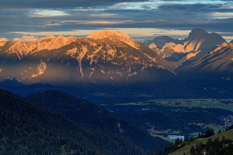 Distant view of steep mountains in the evening light, clouds, autumn, view from Wank to Karwendel