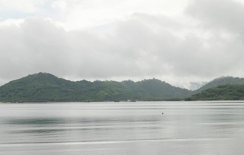 Lombok and Gili Air islands, overcast, cloudy day, sky and sea. Vacation, travel, tropics concept,