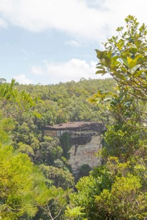 Cliff in Bako national park, sunny day, blue sky and sea. Vacation, travel, tropics concept, no