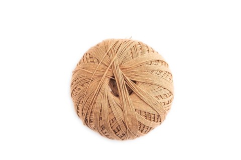 Spool of thread isolated on white background. Top view, flat lay, close up