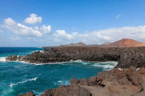 Rocky coast of Los Hervideros, volcanic landscape, Timanfaya National Park, Lanzarote, Canary