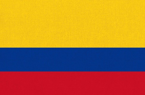 Close-up of a textured flag with horizontal yellow, blue, and red stripes, Flag of Colombia.