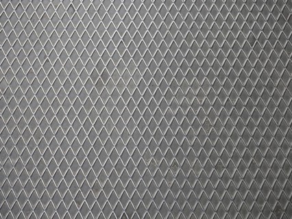 Grey steel mesh metal texture background