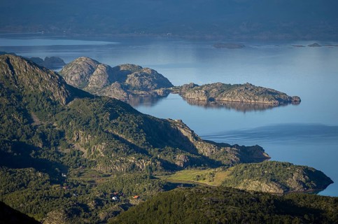 Coast in atmospheric evening light, view from the top of Dronningsvarden or Stortinden,