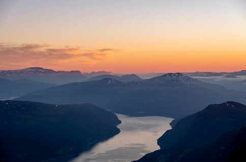 View of Faleidfjorden fjord, mountain peaks in soft light at sunset, view from the top of Skala,