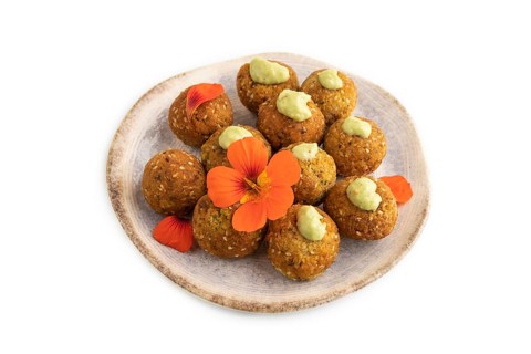 Falafel with guacamole isolated on white. Side view, close up