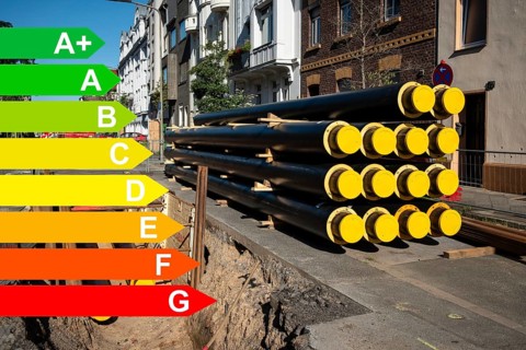 A stack of new pipes for district heating at a construction site, graphic with energy efficiency