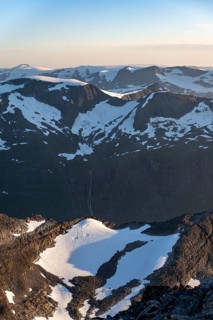 Mountain peak with Jostedalsbreen glacier in the evening light, view from the summit of Skala,