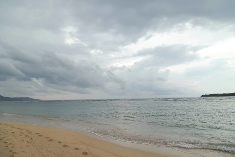 Lombok and Gili Air islands, overcast, cloudy day, sky and sea. Vacation, travel, tropics concept,