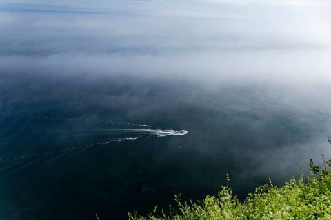 Coastal seascape, fishing boat in fog, Gulf of Saint Lawrence, Province of Quebec, Canada, sea,