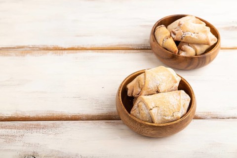 Homemade sweet cookie with apple jam on white wooden background. side view, copy space