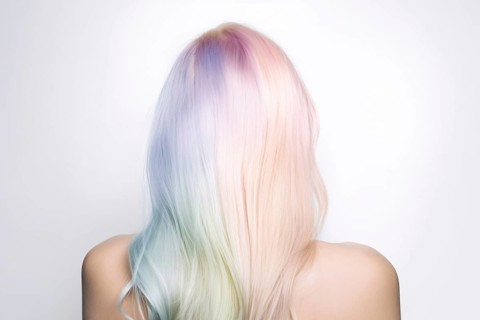 Back view of woman with rainbow pastel colored hair. KI generiert, generiert AI generated