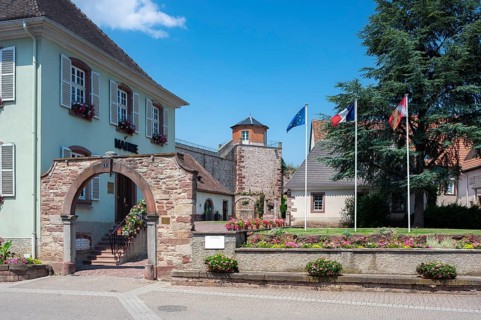 Town hall with historic municipal wine press and former town wall, Westhoffen, Alsace, France,